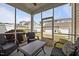 Relax on the screened-in patio with outdoor seating, perfect for enjoying the fresh air and backyard view at 1394 Southpoint Trl, Durham, NC 27713