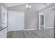 Open concept dining area with light grey walls and wood-look vinyl floors at 1443 Smokey Mountain Dr, Zebulon, NC 27597