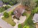 Stunning aerial view of a well-manicured home with lush landscaping and a spacious driveway, showcasing its curb appeal at 1508 Samuel Wait Ln, Wake Forest, NC 27587