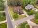 Aerial view of the home with manicured lawns and mature trees in a quiet suburban setting at 1508 Samuel Wait Ln, Wake Forest, NC 27587