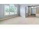 Serene bedroom with large windows, neutral carpeting, and custom built-in shelving with lots of light at 1508 Samuel Wait Ln, Wake Forest, NC 27587