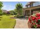 Beautiful front yard with stone walkway, bench, and mature landscaping leading to the front door at 1508 Samuel Wait Ln, Wake Forest, NC 27587
