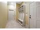 Mud room/hallway features tile flooring, built-in shelving and bench at 1508 Samuel Wait Ln, Wake Forest, NC 27587