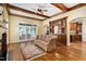 Bright living room with hardwood floors, coffered ceilings, and an abundance of natural light at 1508 Samuel Wait Ln, Wake Forest, NC 27587