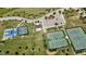 Aerial view of Briar Chapel's tennis and basketball courts, parking, and green spaces at 151 Monteith Dr, Chapel Hill, NC 27516