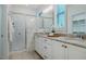 Elegant bathroom with double vanity, granite countertop, and a glass-enclosed shower at 151 Monteith Dr, Chapel Hill, NC 27516