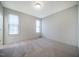 Clean and bright empty bedroom featuring neutral carpet, modern windows and ample space at 151 Monteith Dr, Chapel Hill, NC 27516