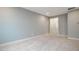 Neutral carpeted bonus room with recessed lighting and doorway to another room at 151 Monteith Dr, Chapel Hill, NC 27516