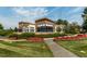 Modern community center with stone accents, beautiful landscaping, and inviting walkway at 151 Monteith Dr, Chapel Hill, NC 27516