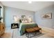 Tranquil main bedroom decorated with soft tones, decorative lamps and a stylish area rug at 151 Monteith Dr, Chapel Hill, NC 27516