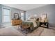Comfortable main bedroom featuring neutral tones, soft carpet and windows for natural light at 151 Monteith Dr, Chapel Hill, NC 27516