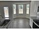 Modern Kitchen features granite countertops, stainless steel appliances, and lots of natural light at 152 Springtooth Dr, Zebulon, NC 27597