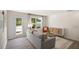 Living room featuring an open layout, perfect for entertaining, with a gray sofa and modern decor at 158 Holmes Corner Dr, Smithfield, NC 27577