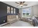 Neutral Bedroom with a crib, accent wall, and a large window, creating a calm atmosphere at 159 Mitchell Manor Dr, Angier, NC 27501