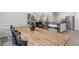 Open-concept living space seamlessly connecting the dining area, living room, and modern kitchen at 159 Mitchell Manor Dr, Angier, NC 27501