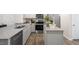 Well-equipped kitchen with granite countertops, stainless steel appliances, sleek cabinets, and modern fixtures for efficient cooking at 162 Holmes Corner Dr, Smithfield, NC 27577