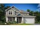 Charming two-story home featuring gray siding, a two-car garage, and a welcoming front porch at 162 Sugar Pine Drive, Franklinton, NC 27525
