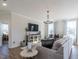 Comfortable living room with hardwood floors and lots of natural light at 162 Sugar Pine Drive, Franklinton, NC 27525