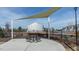 Outdoor community space features a shaded seating area with picnic table and view of neighborhood homes at 177 Holton St, Smithfield, NC 27577