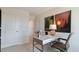 Home office space with a neutral color scheme, desk, chair, and natural lighting at 177 Holton St, Smithfield, NC 27577