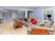 Open basement featuring a comfortable seating area and a ping pong table for entertainment at 1952 Combine Cir, Apex, NC 27502