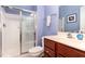 Cozy bathroom featuring a shower and a vanity with a sink, all in soft tones at 1952 Combine Cir, Apex, NC 27502