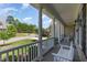 Inviting front porch with rocking chairs, offering a peaceful view of the neighborhood at 1952 Combine Cir, Apex, NC 27502