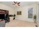 Bright office space with a large window, neutral walls and plush carpet at 1952 Combine Cir, Apex, NC 27502