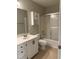 Bathroom with a vanity, and a shower with glass doors, and neutral design at 210 Standish Dr Dr, Chapel Hill, NC 27517