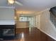 Spacious living room featuring a fireplace, hardwood floors, and an open floor plan at 210 Standish Dr Dr, Chapel Hill, NC 27517