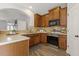 Well-equipped kitchen with stainless steel appliances and plenty of counter space at 223 Morgan Brook Way, Rolesville, NC 27571