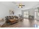 Spacious living room with hardwood floors and a comfortable seating area at 223 Morgan Brook Way, Rolesville, NC 27571