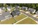 Aerial view of a house featuring a fenced backyard, well-maintained lawn, and neighborhood at 236 Artisan Park Dr, Wake Forest, NC 27587