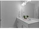 Bathroom features a double sink vanity, large mirror, and modern fixtures at 236 Artisan Park Dr, Wake Forest, NC 27587