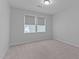 Bedroom featuring neutral walls, carpet, and natural light from the bright window at 236 Artisan Park Dr, Wake Forest, NC 27587