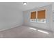 Bright bedroom featuring neutral walls, carpet, and natural light from the lovely window at 236 Artisan Park Dr, Wake Forest, NC 27587