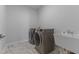 Laundry room featuring sink and washer/dryer at 236 Artisan Park Dr, Wake Forest, NC 27587