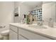Modern bathroom with dual sinks, white quartz countertop, and cabinets providing ample storage space at 24 Grove Township Way, Angier, NC 27501