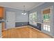 Dining area with hardwood floors, a backyard view, and direct access to the back deck at 25 Ballinger Dr, Youngsville, NC 27596