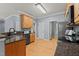 Kitchen with granite counters, stainless appliances, and wood flooring at 25 Ballinger Dr, Youngsville, NC 27596