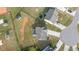 Aerial view of a home with a large yard, driveway, and surrounding neighborhood at 25 Gallery Park Dr, Franklinton, NC 27525