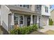 Inviting front porch featuring a cozy bench and tasteful landscaping details enhance curb appeal at 25 Gallery Park Dr, Franklinton, NC 27525