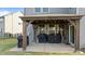 Cozy outdoor patio with a charming wood frame, perfect for grilling and relaxing at 25 Gallery Park Dr, Franklinton, NC 27525
