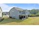 Spacious backyard featuring a covered patio, perfect for outdoor relaxation and entertainment at 25 Gallery Park Dr, Franklinton, NC 27525