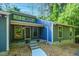Inviting entrance with stone steps, stylish lighting, and a well-maintained blue exterior at 2511 Bexley Ave, Durham, NC 27707