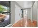 Bright foyer with hardwood floors and large windows offering a pleasant view of the outdoors at 2511 Bexley Ave, Durham, NC 27707
