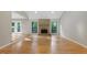 Large living room with a brick fireplace and natural light at 2511 Bexley Ave, Durham, NC 27707