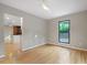 Living room with hardwood floors and an open layout to the kitchen at 2511 Bexley Ave, Durham, NC 27707