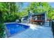 A beautiful in-ground pool is nestled behind this charming house at 2511 Bexley Ave, Durham, NC 27707