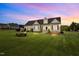 Charming single-story home with a beautifully manicured lawn and mature landscaping at 281 Derwin Dr, Timberlake, NC 27583